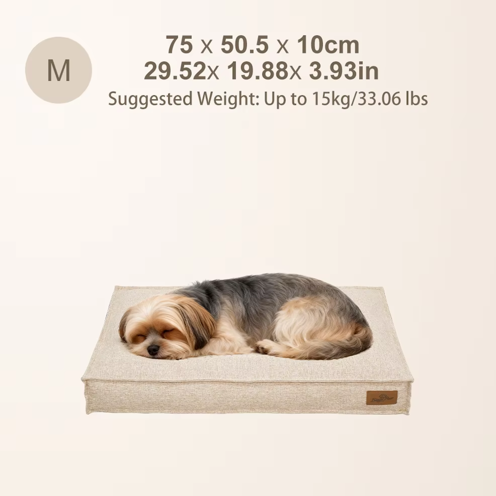 A small dog sleeps on a medium beige dog bed with dimensions of 75x50.5x10cm for pets up to 15kg/33.06lbs.