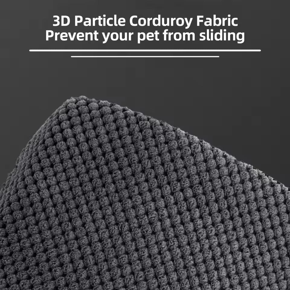Textured gray 3D particle corduroy fabric designed to prevent pet sliding.