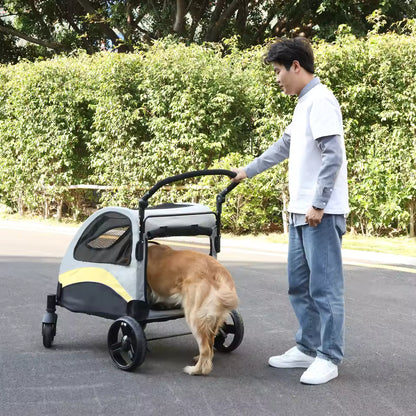 Golden Retriever stepping out of a gray and yellow pet stroller while a person stands nearby outdoors.
